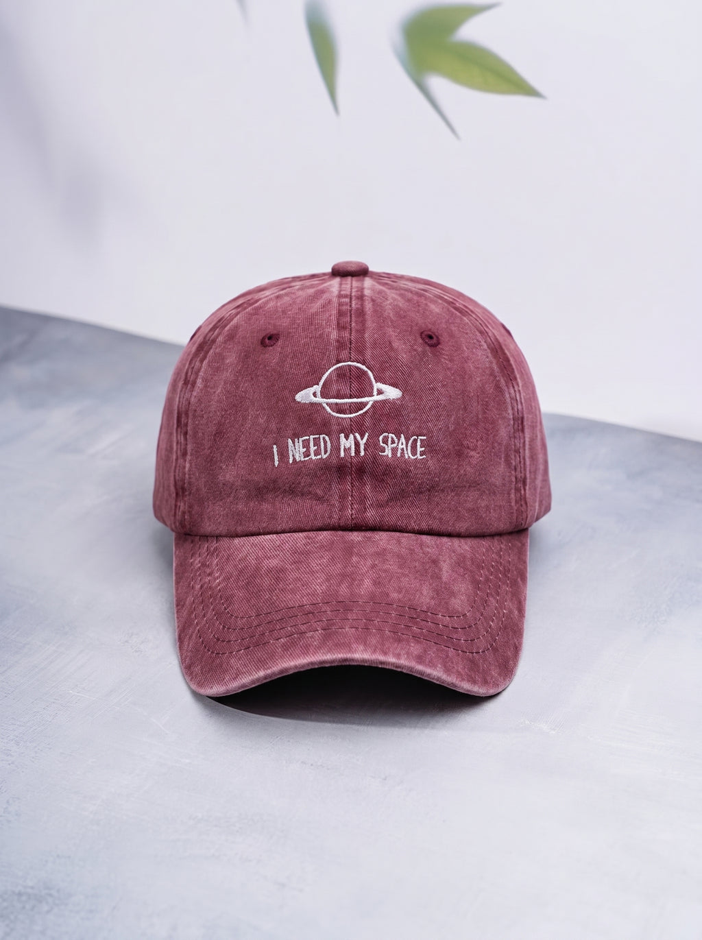 Space Needed Burgundy CAP