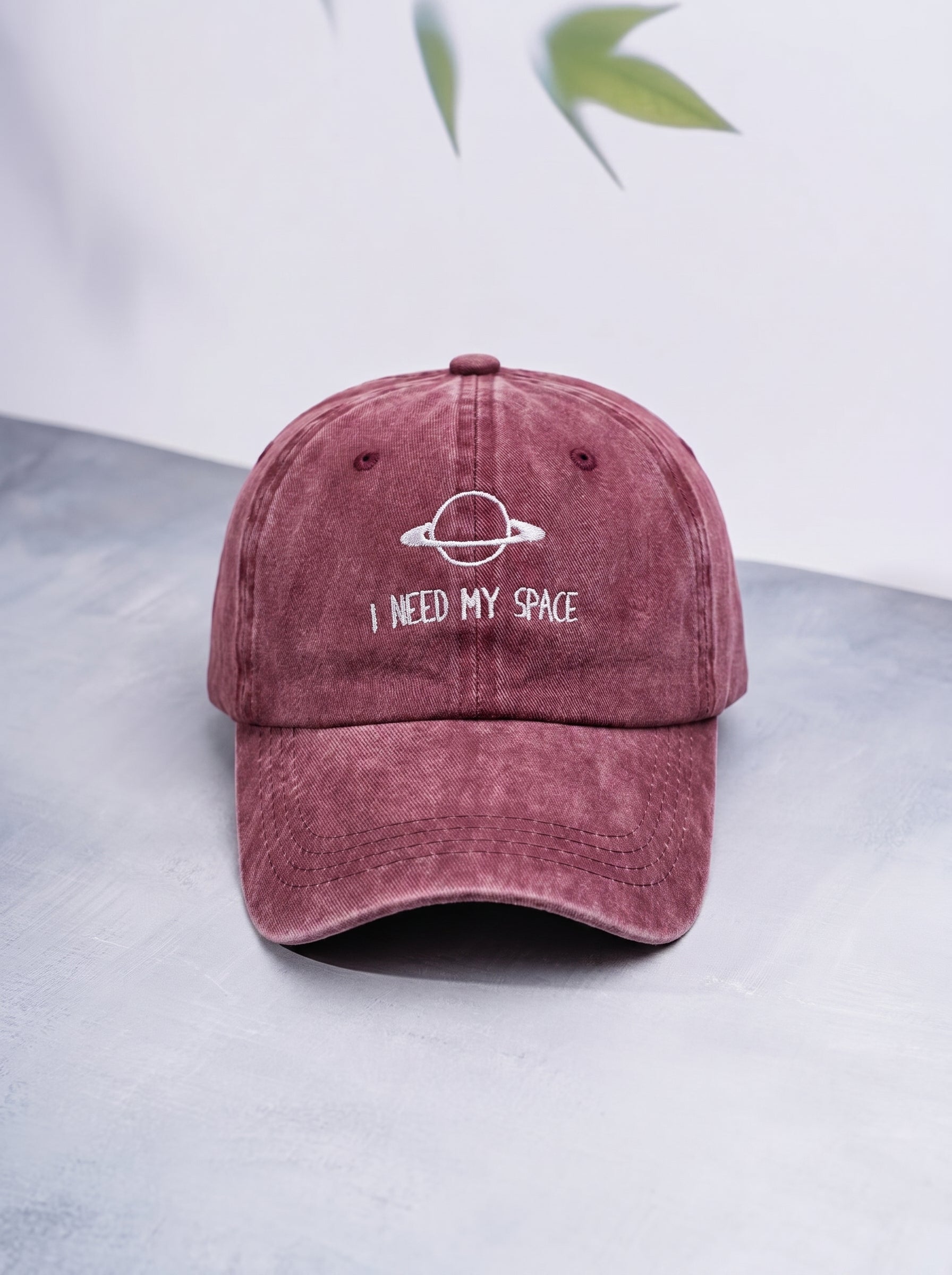 Space Needed Burgundy CAP